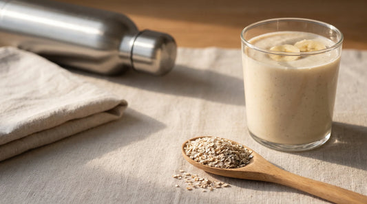 A rye bran shake on a kitchen bench with a water bottle and towel