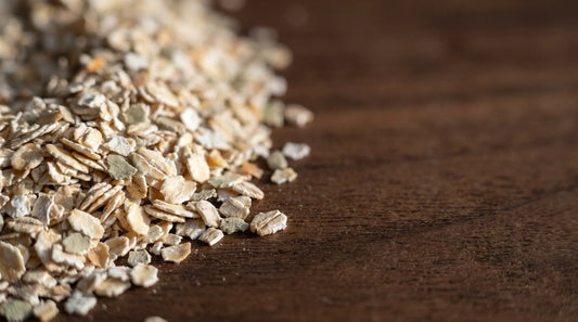 Macro photograph of cold-processed rye bran flakes showing their layered papery structure