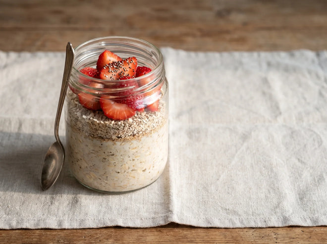 A jar of overnight oats made with Ryedical rye bran and topped with fresh fruit