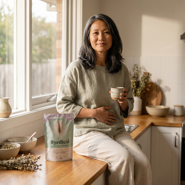 Woman holding a cup in a kitchen with Ryedical product on the counter